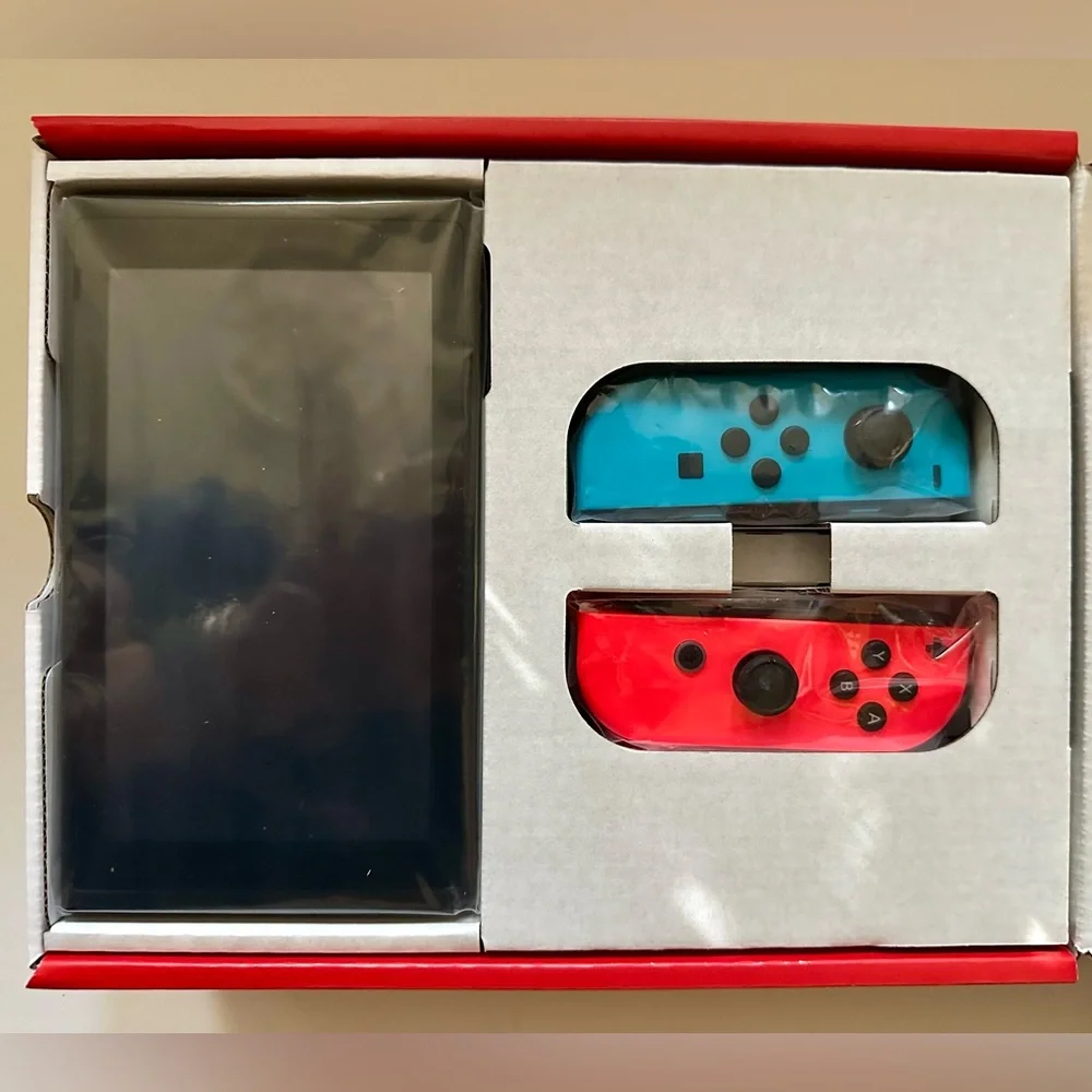 BNIP - UNOPENED - NINTENDO SWITCH WITH NEON BLUE AND NEON RED JOY-CON